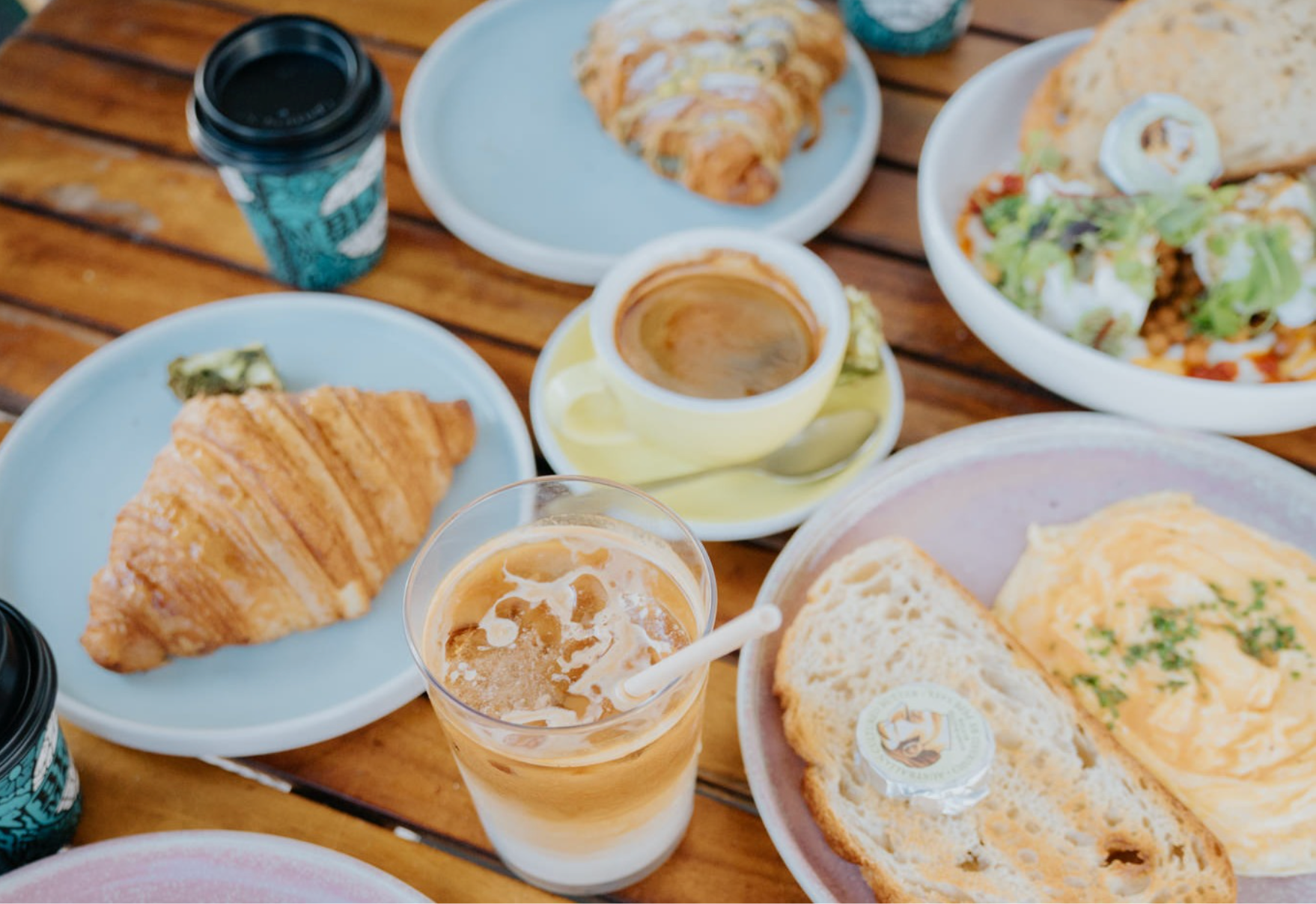 food and coffee selection on a table at UpSouth Bondi