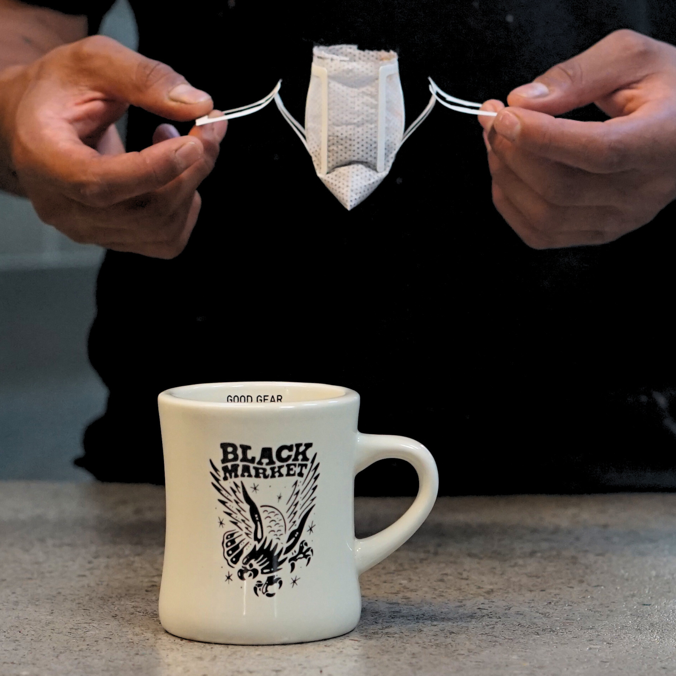 Liberty Blend coffee grounds in single serve drip bag filter