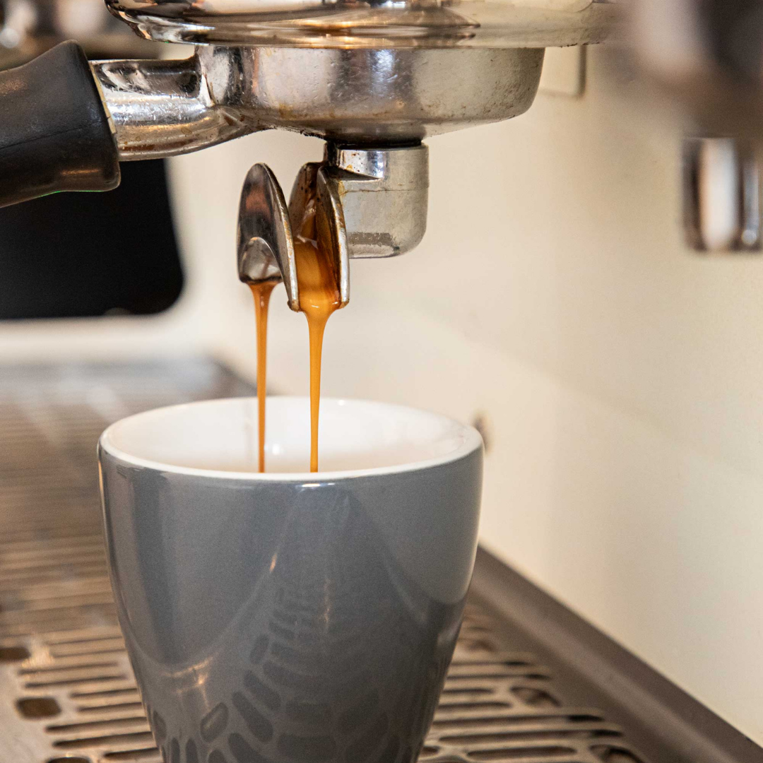 Fresh roasted coffee being using on a commercial coffee machine, Black Market Coffee