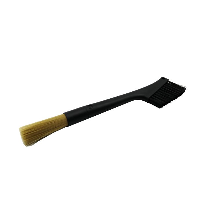 Coffee Grinder Cleaning brush with black handle and yellow bristle head on a white background